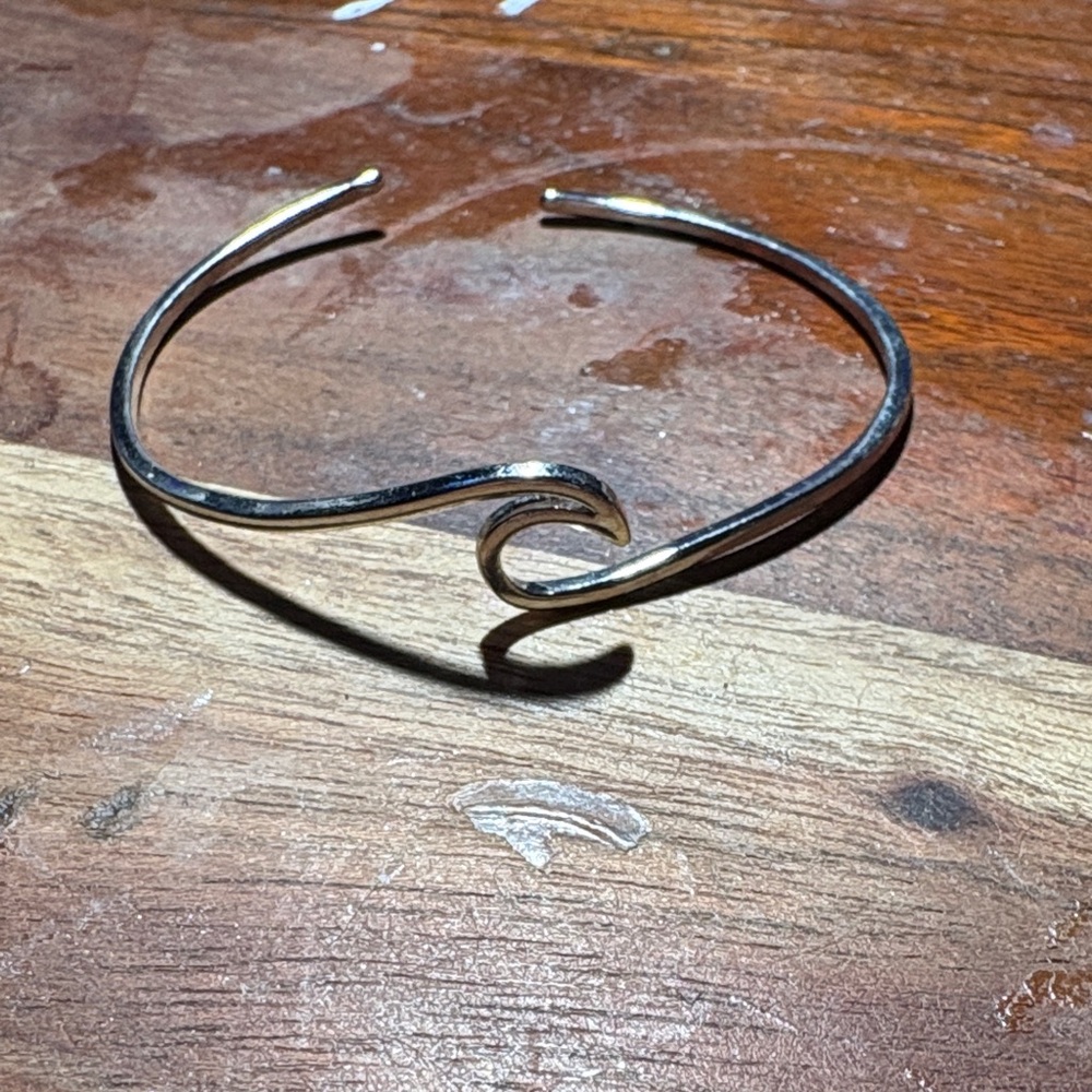 Elegant Silver Wave Bracelet